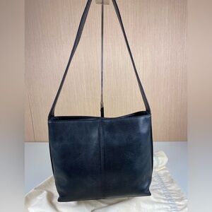 HOBO International genuine leather shoulder bag in classic black.